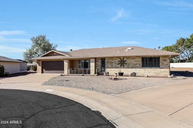 ranch-style home with a garage