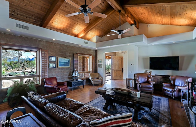 living room with high vaulted ceiling, wooden ceiling, hardwood / wood-style floors, and beam ceiling