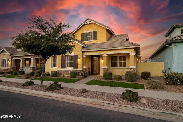 craftsman inspired home featuring a porch