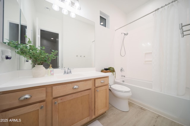 full bathroom featuring wood-type flooring, vanity, toilet, and shower / bathtub combination with curtain