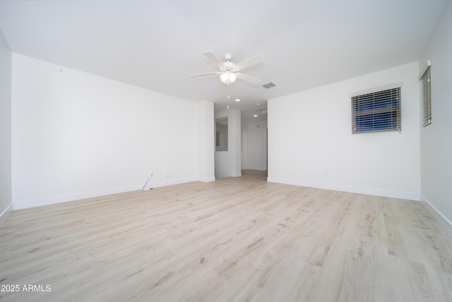 unfurnished room featuring light hardwood / wood-style flooring and ceiling fan