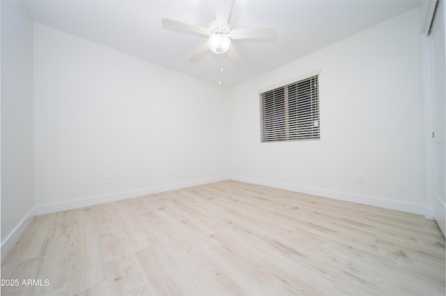 unfurnished room with ceiling fan and light hardwood / wood-style floors