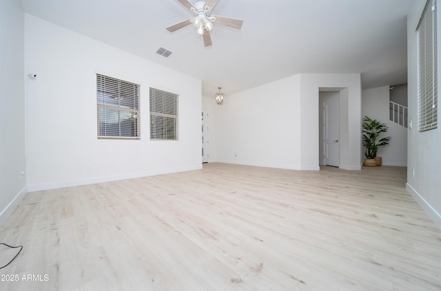 spare room with ceiling fan and light hardwood / wood-style floors