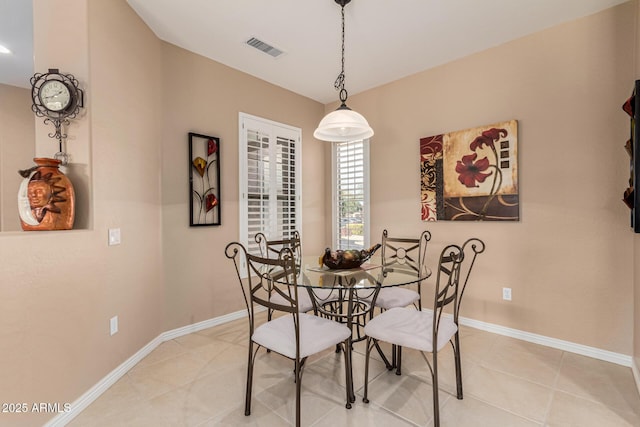 view of tiled dining space