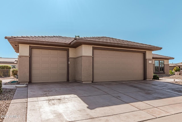 prairie-style home with a garage