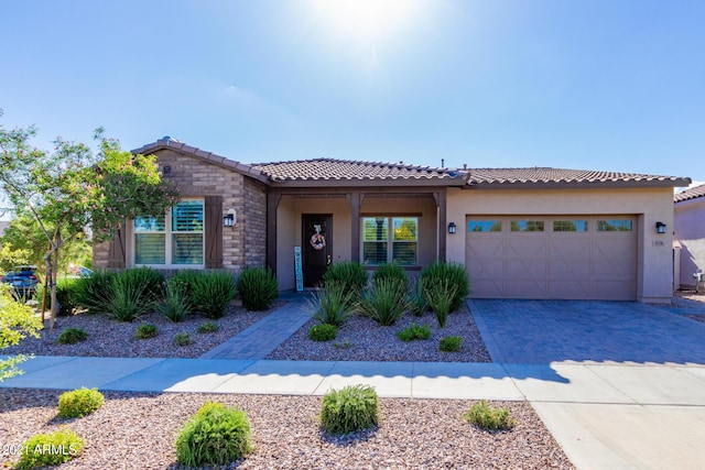 view of front of property featuring a garage