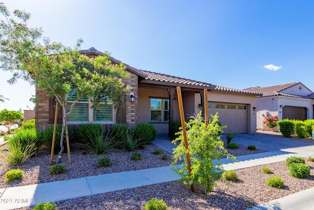 view of front of home with a garage