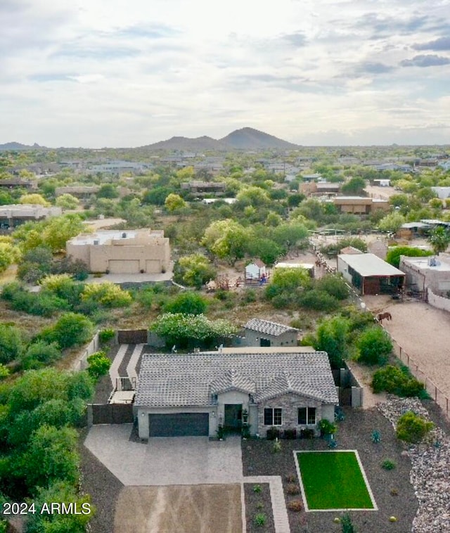 drone / aerial view featuring a mountain view