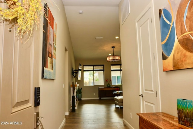 corridor featuring dark hardwood / wood-style flooring