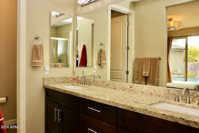 bathroom with dual vanity