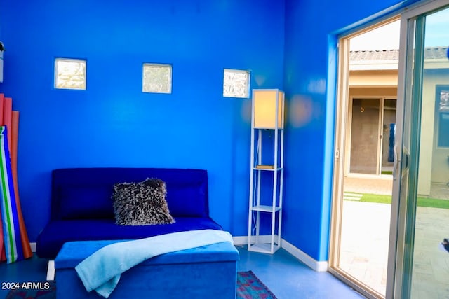 bedroom with concrete flooring