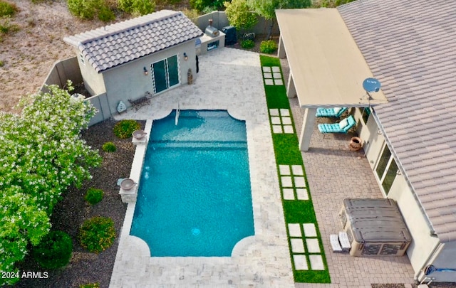 view of pool with a patio area