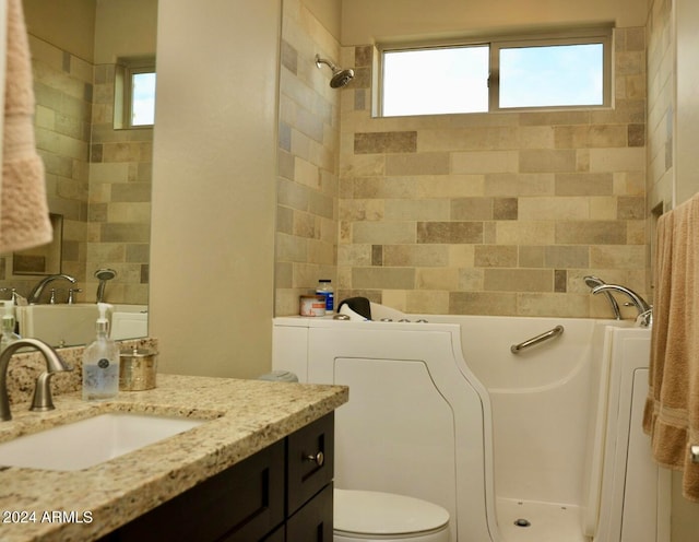 bathroom featuring radiator, vanity, and toilet