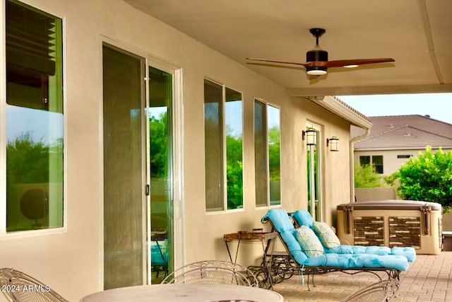 view of terrace featuring ceiling fan