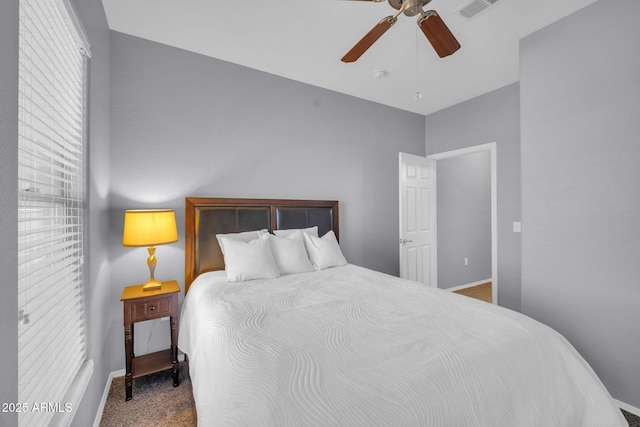 14250 W Wigwam Blvd Unit 2722, Litchfield Park, AZ 85340 - bedroom with carpet flooring, baseboards, and a ceiling fan