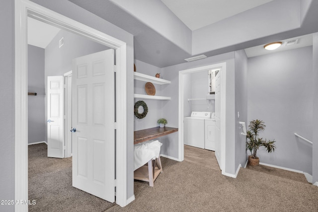 14250 W Wigwam Blvd Unit 2722, Litchfield Park, AZ 85340 - hallway featuring separate washer and dryer, carpet flooring, and baseboards