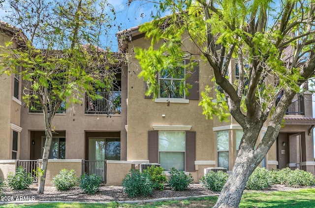 14250 W Wigwam Blvd Unit 2722, Litchfield Park, AZ 85340 - view of building exterior with a fenced front yard