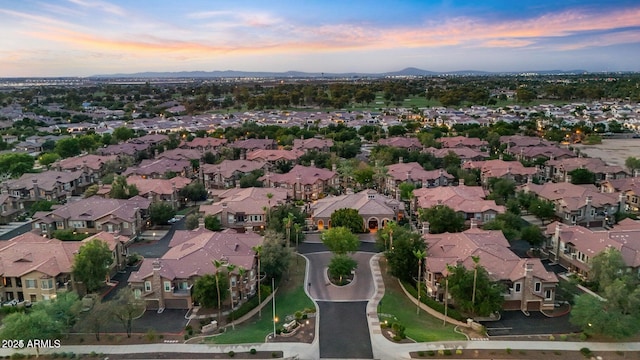 14250 W Wigwam Blvd Unit 2722, Litchfield Park, AZ 85340 - aerial view at dusk of a residential view and a mountain view
