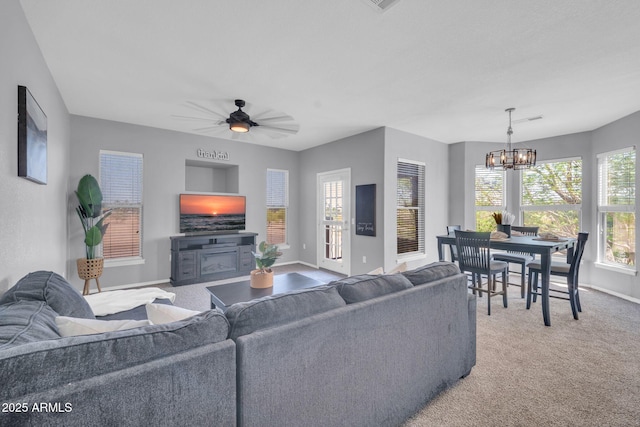 14250 W Wigwam Blvd Unit 2722, Litchfield Park, AZ 85340 - living area with light carpet, baseboards, a chandelier, and ceiling fan