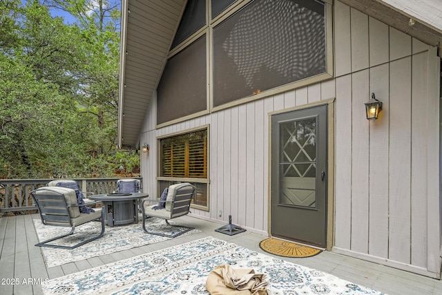 doorway to property featuring a wooden deck