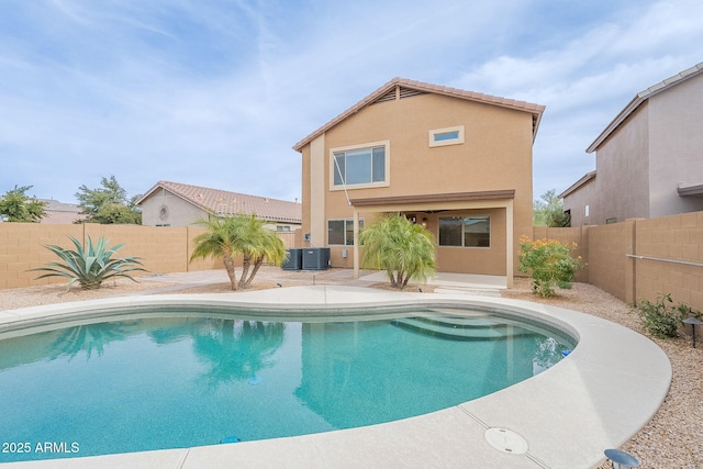 view of swimming pool with central AC and a patio