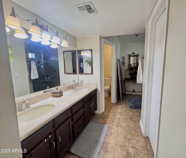 8908 W Sheridan St, Phoenix, AZ 85037 - full bath with tile patterned flooring and double vanity