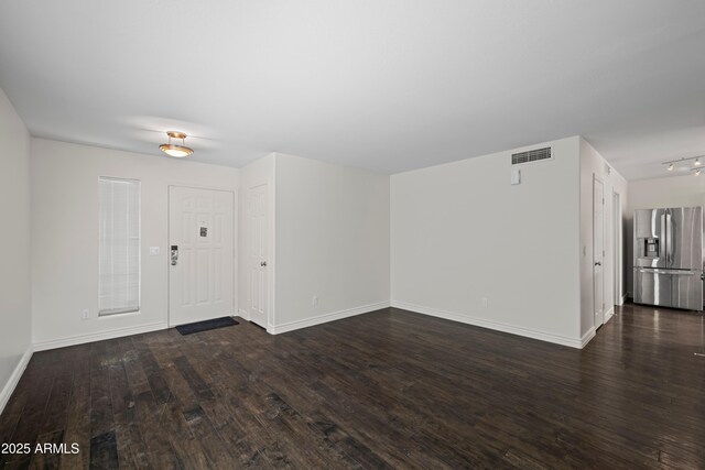2168 E Vista Bonita Dr, Phoenix, AZ 85024 - unfurnished living room with dark wood finished floors and baseboards
