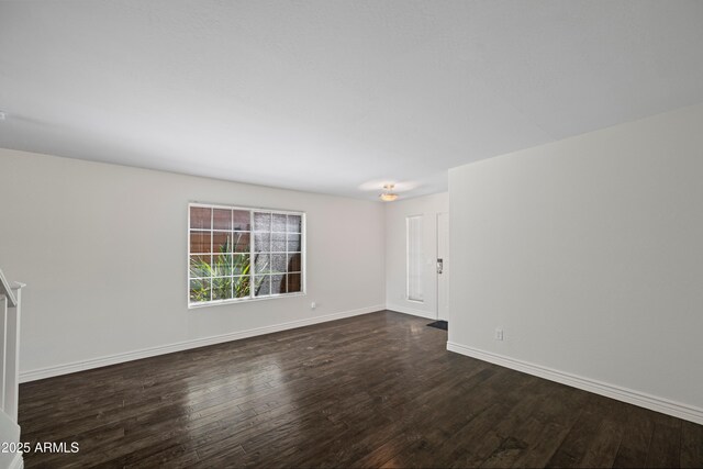 2168 E Vista Bonita Dr, Phoenix, AZ 85024 - empty room featuring dark wood-style floors and baseboards