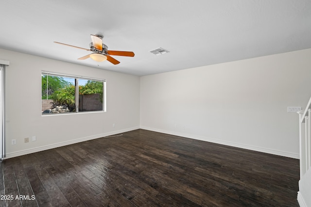 2168 E Vista Bonita Dr, Phoenix, AZ 85024 - unfurnished room with dark wood-type flooring, ceiling fan, and baseboards
