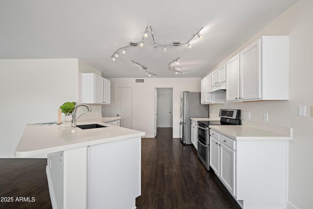 2168 E Vista Bonita Dr, Phoenix, AZ 85024 - kitchen featuring appliances with stainless steel finishes, a sink, a peninsula, white cabinetry, and light countertops