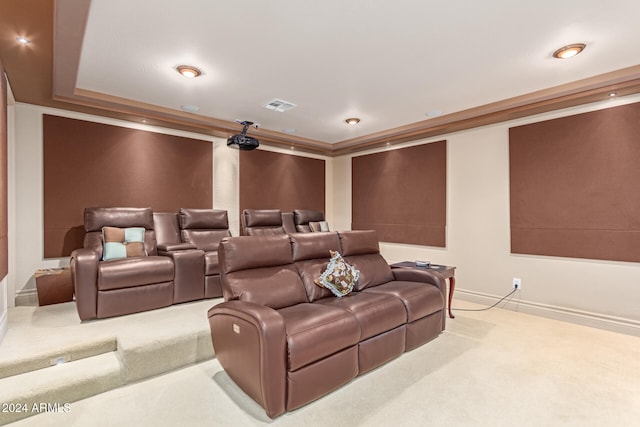 home theater featuring light carpet and crown molding