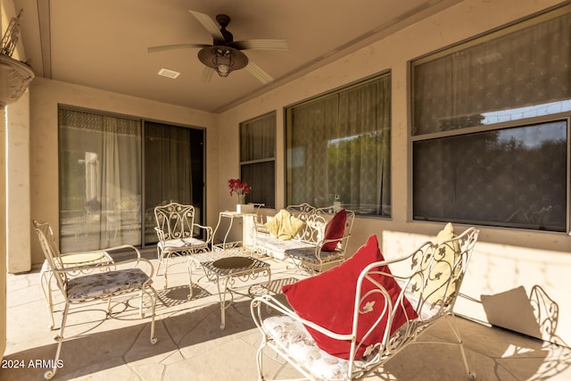 view of patio with ceiling fan