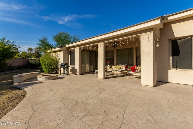 view of patio with a grill