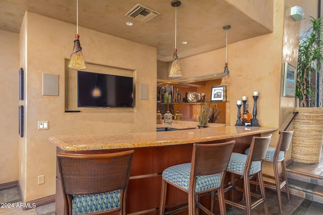 bar featuring baseboards, visible vents, hanging light fixtures, indoor wet bar, and recessed lighting