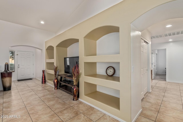 136 N 236th Ave, Buckeye, AZ 85396 - corridor with visible vents, baseboards, built in shelves, recessed lighting, and light tile patterned floors
