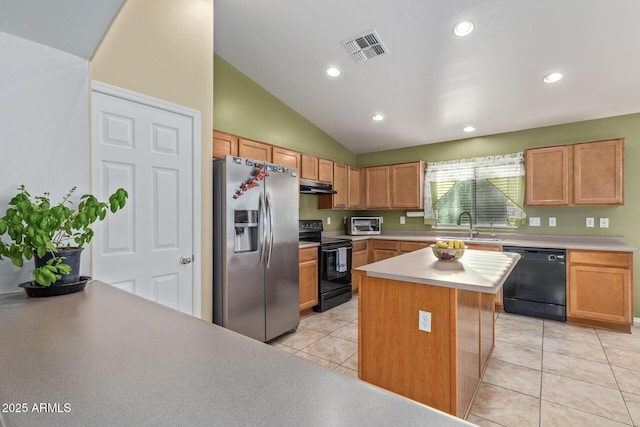 136 N 236th Ave, Buckeye, AZ 85396 - kitchen with under cabinet range hood, a sink, light tile patterned flooring, visible vents, and black appliances