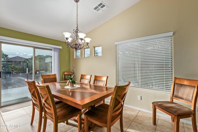 136 N 236th Ave, Buckeye, AZ 85396 - dining space with a chandelier, lofted ceiling, light tile patterned floors, baseboards, and visible vents