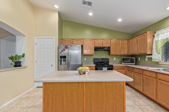 136 N 236th Ave, Buckeye, AZ 85396 - kitchen with light countertops, light tile patterned floors, stainless steel appliances, under cabinet range hood, and visible vents