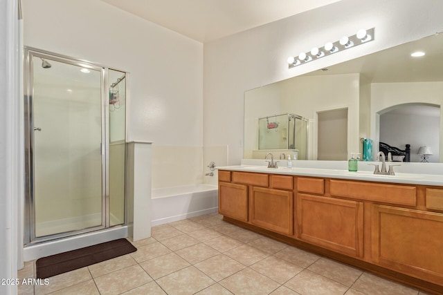 136 N 236th Ave, Buckeye, AZ 85396 - full bath featuring tile patterned floors, a sink, and a stall shower