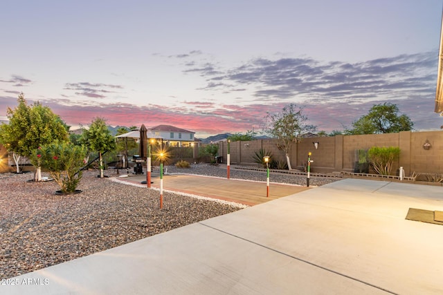 136 N 236th Ave, Buckeye, AZ 85396 - exterior space with a patio and a fenced backyard