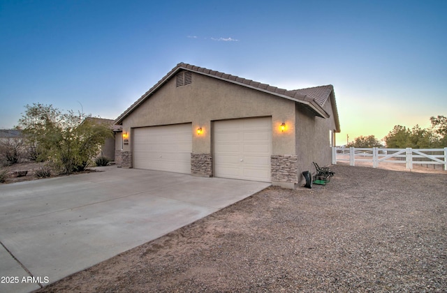 view of property exterior at dusk