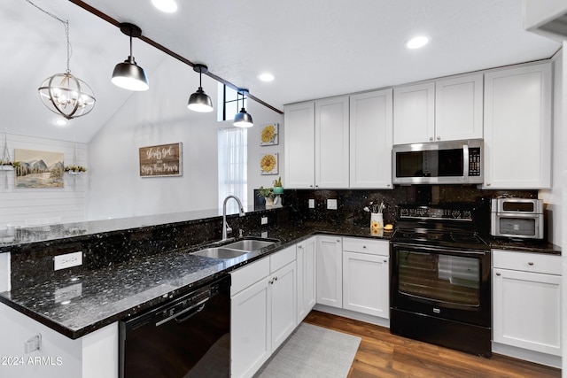 kitchen with sink, black appliances, decorative light fixtures, and white cabinets