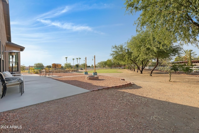 view of community with a patio