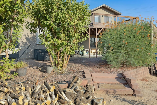 view of yard with a wooden deck