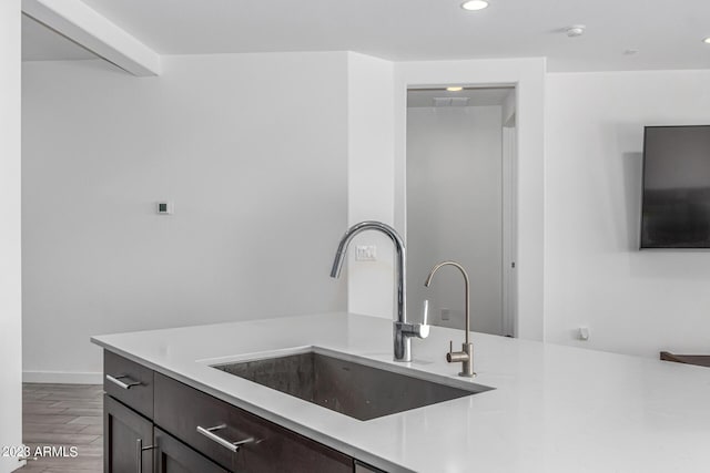 kitchen featuring sink and hardwood / wood-style floors