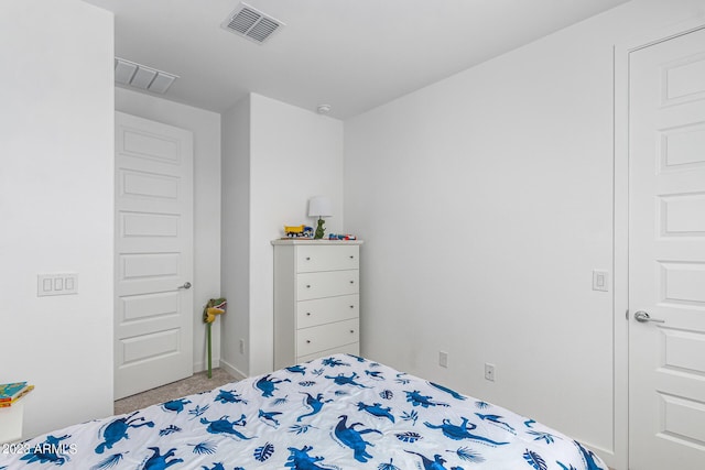 bedroom with light carpet