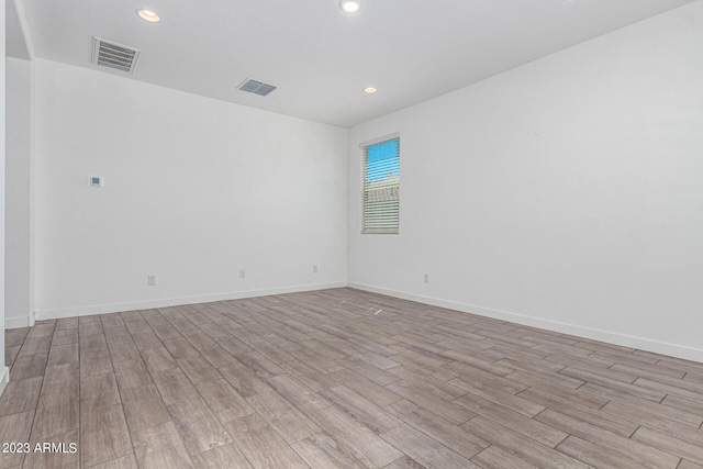 empty room with light wood-type flooring