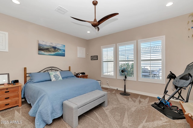 carpeted bedroom with ceiling fan