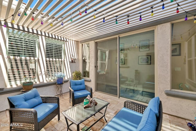 view of patio / terrace featuring a pergola and outdoor lounge area