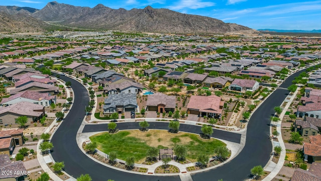 birds eye view of property featuring a mountain view